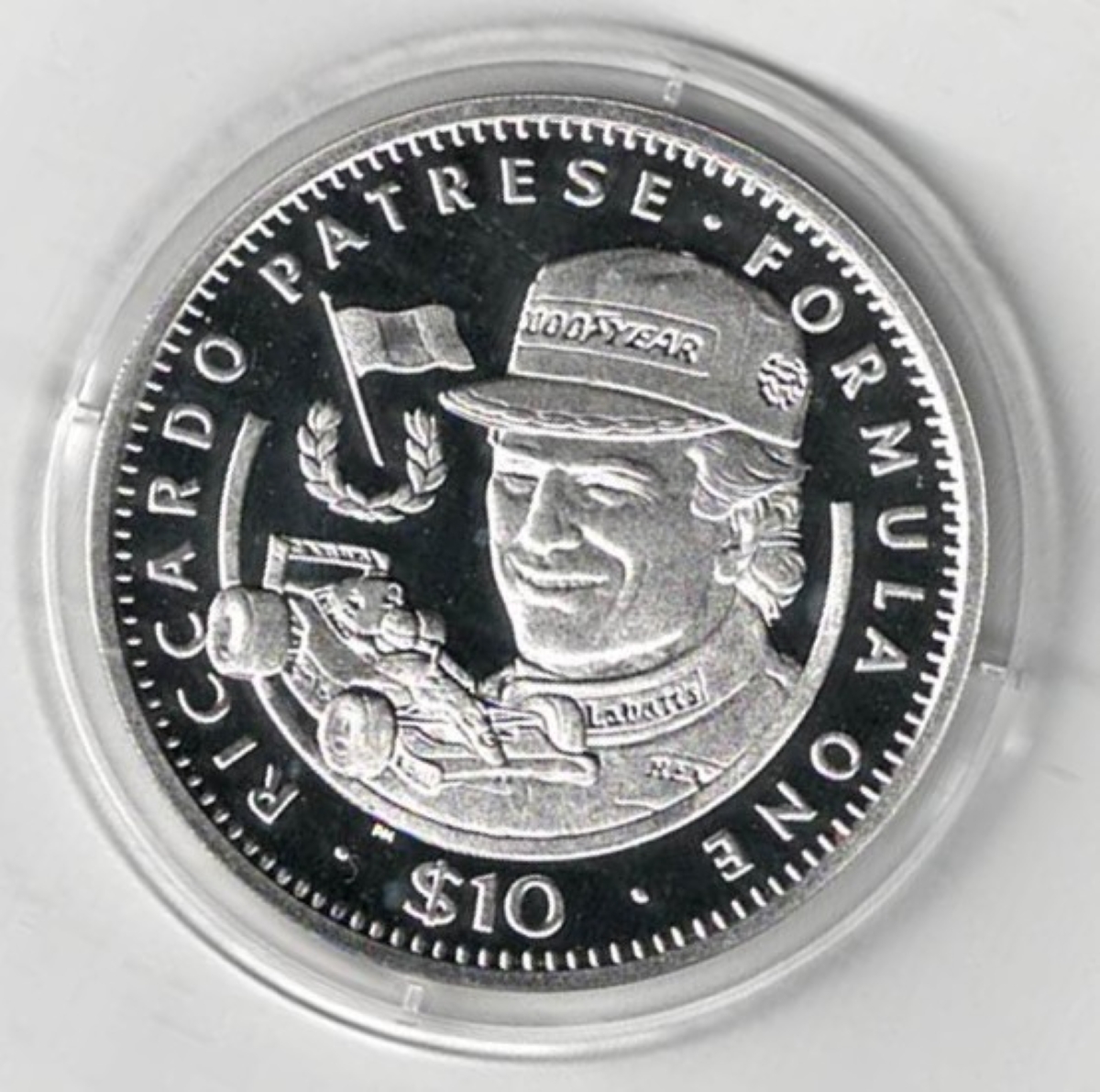 1992 Liberia Silver One Ounce Ricardo Patrese Coin This coin does feature a formula 1 car. This coin contains one ounce of 999 fine silver.