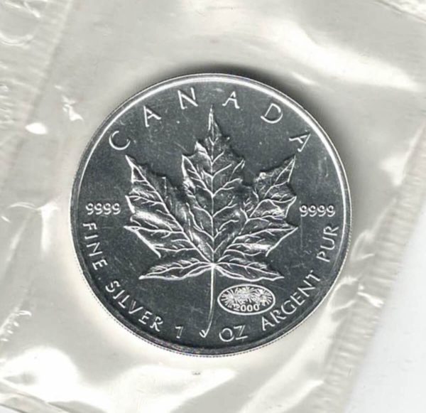 2000 Silver Canada One Ounce Maple. Elizabeth II is on the obverse, The Maple is on the reverse. The coin contains one ounce of 9999 fine silver.