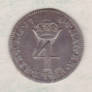 1704 silver maundy fourpence coin featuring Queen Anne on the Obverse. The denomination below a crown dividing date on the Reverse.