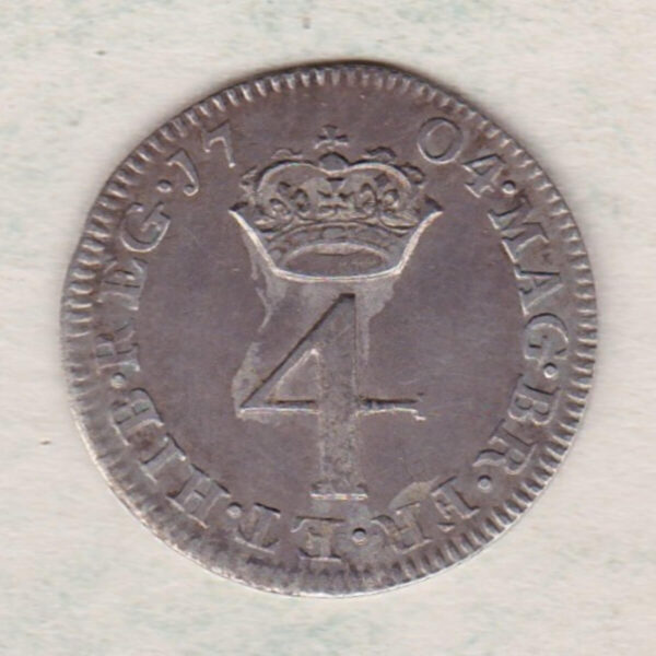 1704 silver maundy fourpence coin featuring Queen Anne on the Obverse. The denomination below a crown dividing date on the Reverse.