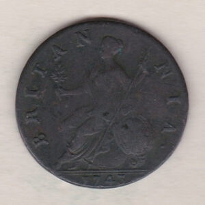 1743 copper halfpenny coin featuring King George II on the Obverse. Britannia seated facing left holding a trident on the Reverse. 