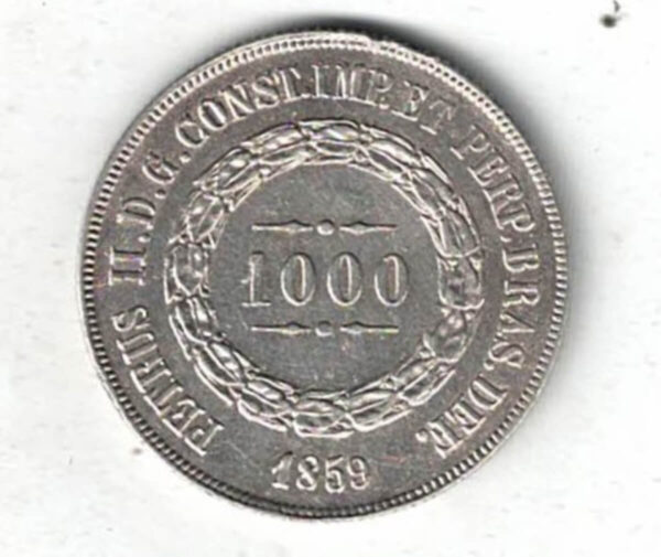 1859 Brazil Silver One Thousand Reis Coin. The obverse features the value within circle. The reverse features the Brazilian Empire coat of arms.