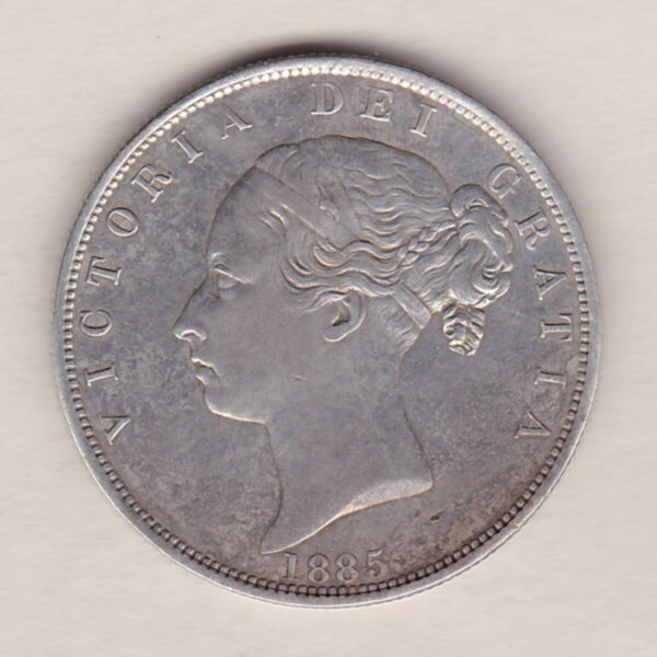 1885 Silver Halfcrown coin with young head Queen Victoria on the Obverse. Crowned square shield with laurel branches on the Reverse.