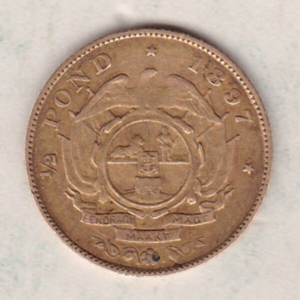 1897 South Africa Gold Half Pond coin featuring Paul Kruger on the Obverse. The Arms of the South African Republic on the reverse.