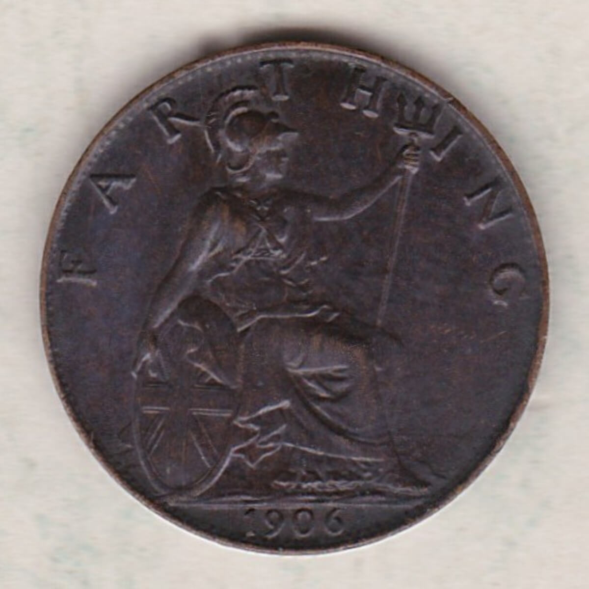 1906 bronze farthing coin featuring King Edward VII on the obverse. The reverse features Britannia with the denomination above and date below.
