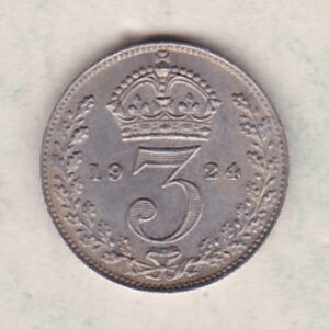 1924 Silver Maundy Threepence coin featuring King George V on the obverse. The reverse features a crowned denomination dividing date within an oak wreath. 