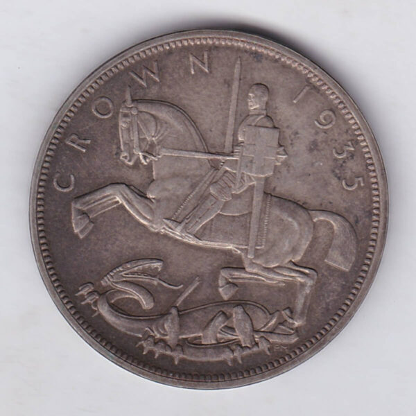 1935 Specimen Silver Proof Crown Coin featuring the uncrowned portrait of King George V on the obverse. St. George slaying the dragon on the reverse.
