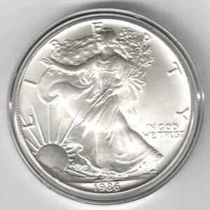 1986 Silver USA One Ounce Eagle. The liberty is on the obverse, The eagle is on the reverse. The coin contains one ounce of 999 fine silver.
