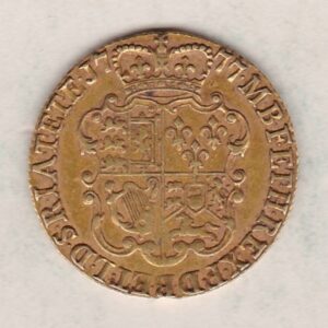 1777 Gold Guinea Coin featuring the fourth laureate head portrait of King George III on the obverse. The crowned quartered shield on the reverse.