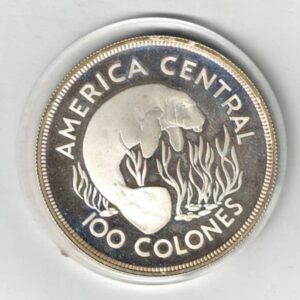 1974 Costa Rica Silver Proof Manatee One Hundred Colones Coin. The obverse side of this coin features the national coat of arms.