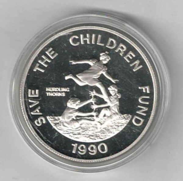 1990 Philippines Silver Proof Save The Children Two Hundred Piso Coin. The obverse side of this coin features the coat of arms of Philippines.