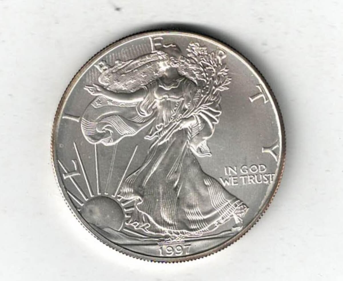 1997 Silver USA One Ounce Eagle. The liberty is on the obverse, The eagle is on the reverse. The coin contains one ounce of 999 fine silver.
