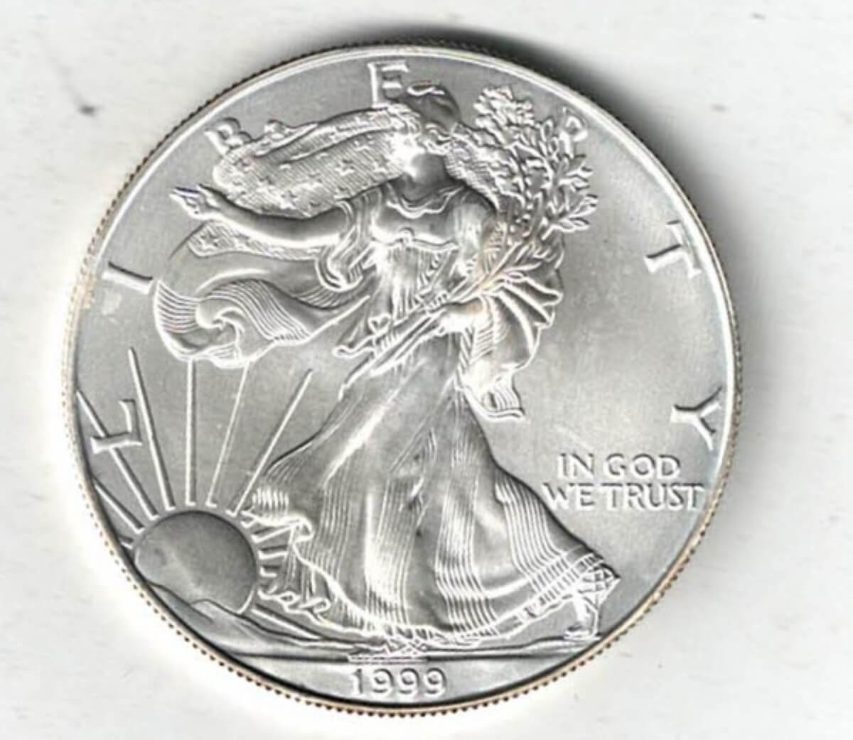 1999 Silver USA One Ounce Eagle. The liberty is on the obverse, The eagle is on the reverse. The coin contains one ounce of 999 fine silver.