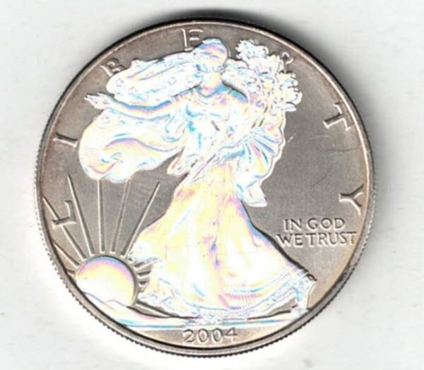 2004 Hologram Silver USA One Ounce Eagle . The liberty is on the obverse, The eagle is on the reverse. The coin contains one ounce of 999 fine silver.