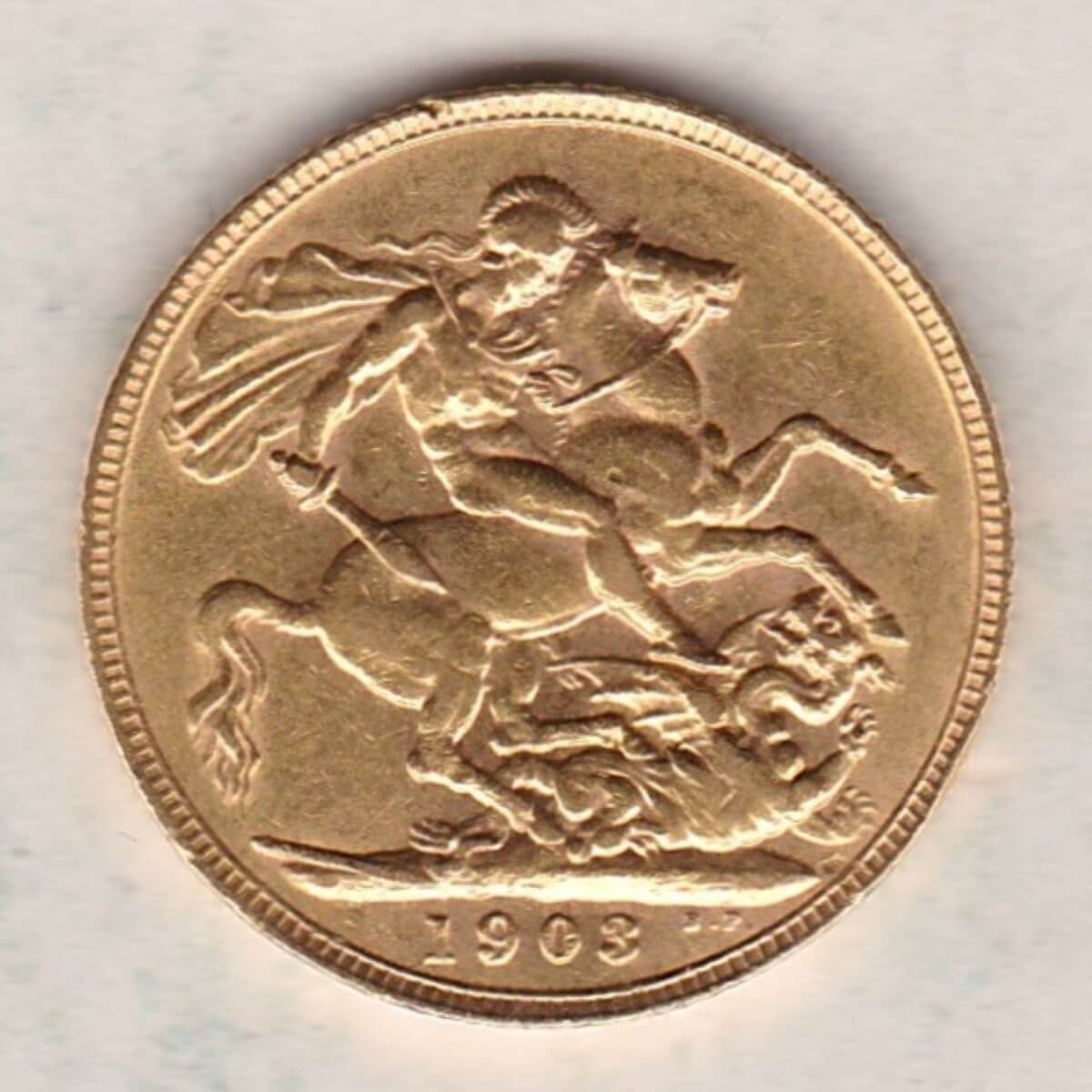 1903 Gold Sovereign Coin. The coin features King Edward VII on the Obverse. St George and the dragon on the reverse. London Mint.