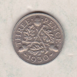 1930 Silver Threepence coin featuring King George V on the obverse. The reverse features three oak sprigs with three acorns.