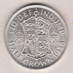 1938 Silver Halfcrown coin featuring the King George VI on the Obverse. The Quartered shield of arms flanked by crowned royal cyphers complete the Reverse.