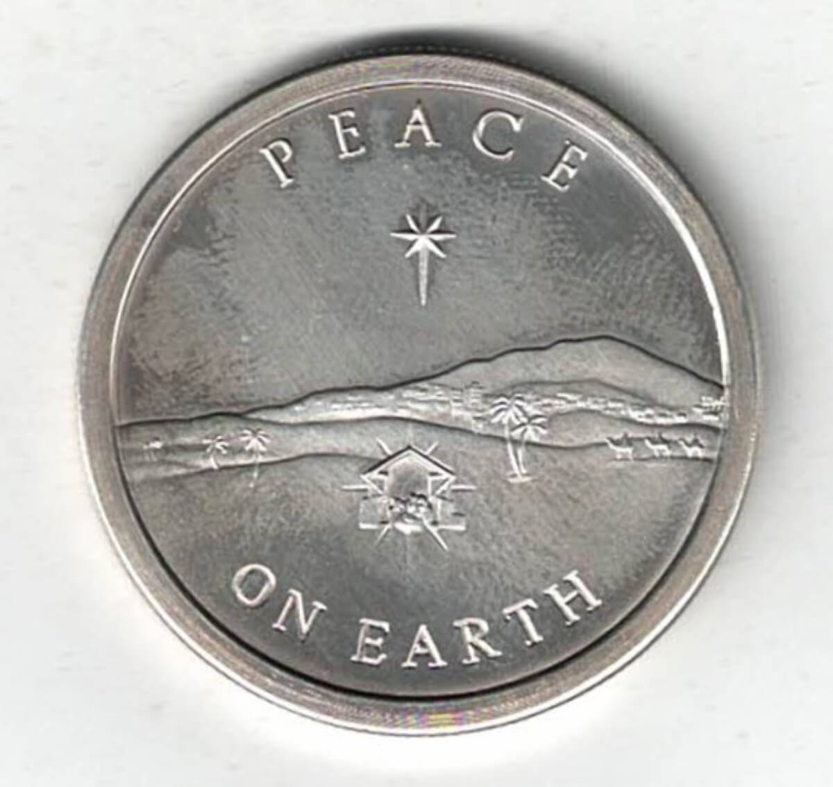 2013 Silver Shield Peace On Earth Silver One Ounce Round. All of our silver coins/rounds have been pre-owned and are in stock for dispatch.