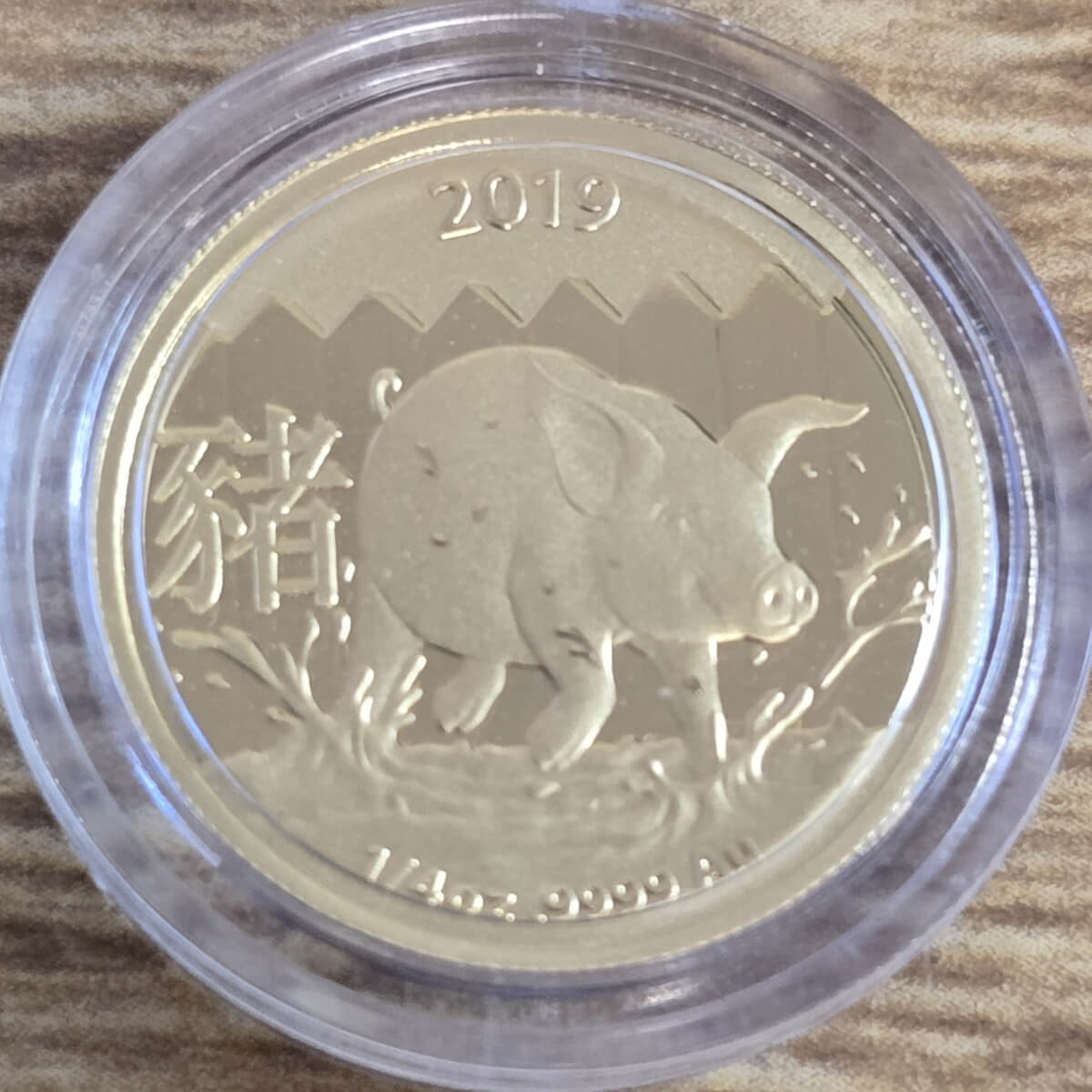 2019 Australia Gold Quarter Ounce coin. The coin was issued as part of the Lunar series II and was struck to celebrate the year of the pig.