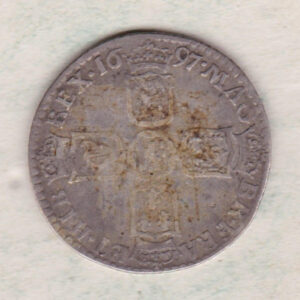 1697 silver sixpence coin featuring King William III on the obverse. The Reverse is completed with crowned cruciform shields around central lion.