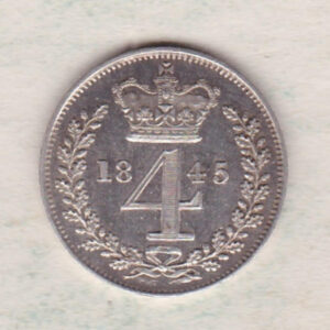 1845 silver maundy fourpence coin featuring Queen Victoria on the Obverse. The crowned denomination dividing date within an oak wreath on the Reverse.