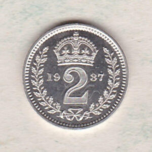 1937 Silver Proof Maundy Twopence coin featuring King George VI on the obverse. A crowned denomination dividing the date on the reverse.