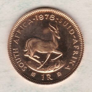 1978 South Africa Gold Proof One Rand coin. The obverse features the portrait of Jan van Riebeeck. The springbok on the Reverse.