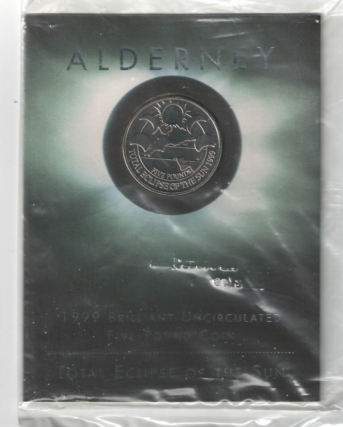 Sealed 1999 Alderney Five Pound Coin Total Eclipse of the Sun Cupro-Nickel. The reverse features Map of Alderney during the Eclipse.