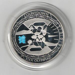 2009 Countdown to London 2012 five pound silver proof coin. The reverse features stylized design of swimmers. Obverse features Queen Elizabeth II.