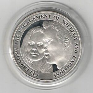 2010 Alderney A Royal Engagement Silver Proof Five Pound Coin. The Obverse features the crowned portrait of Queen Elizabeth II facing right.