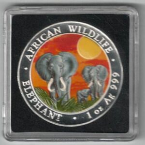 2014 Silver Somali Republic One Ounce Elephant Colourised Day Edition. This Coin does feature two Elephants in the grass.