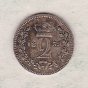 1859 Silver Maundy Twopence coin featuring Queen Victoria on the obverse. A crowned denomination dividing the date on the reverse.