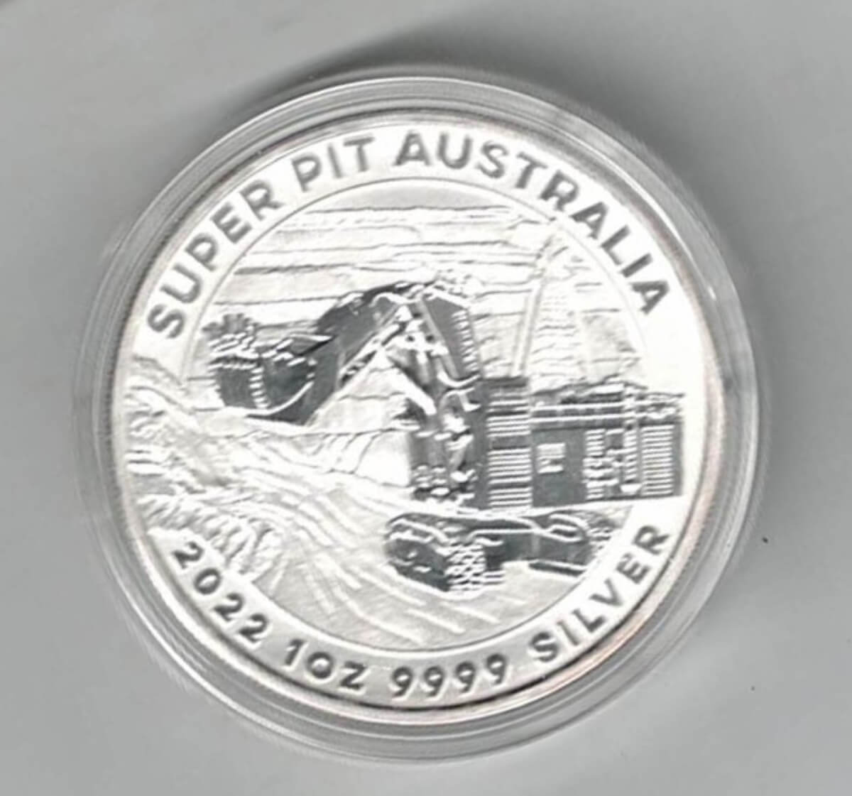 2022 Silver Australia One Ounce Super Pit Coin. Elizabeth II is on the obverse, a digger is on the reverse. All coins are in stock.