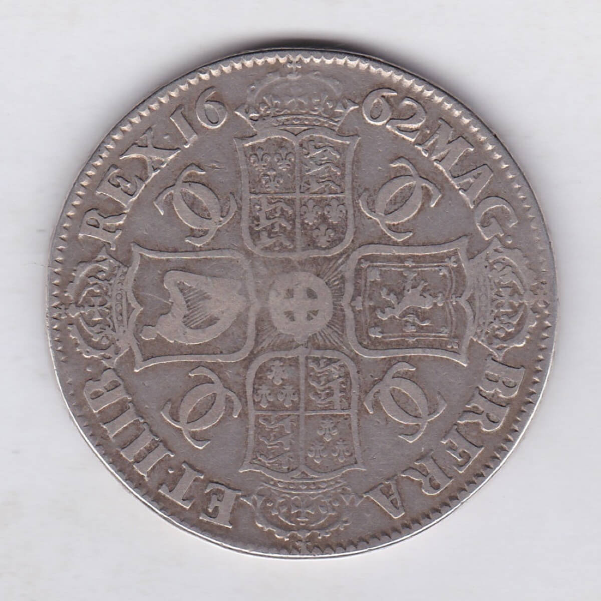 1662 Rose Silver Crown Coin featuring the draped bust of King Charles II on the Obverse and the crowned cruciform of shields on the reverse.