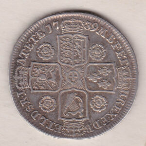 1739 Silver Halfcrown coin with King George II on the Obverse. Crowned cruciform shields with central Garter stars on the Reverse.