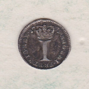 1779 Silver Maundy Penny coin featuring King George III on the obverse. A large central denomination below a crown dividing the date on the reverse.