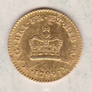 1799 Gold Third Guinea Coin featuring the laureate head portrait of King George III on the obverse. The reverse central crown with legend around and date.