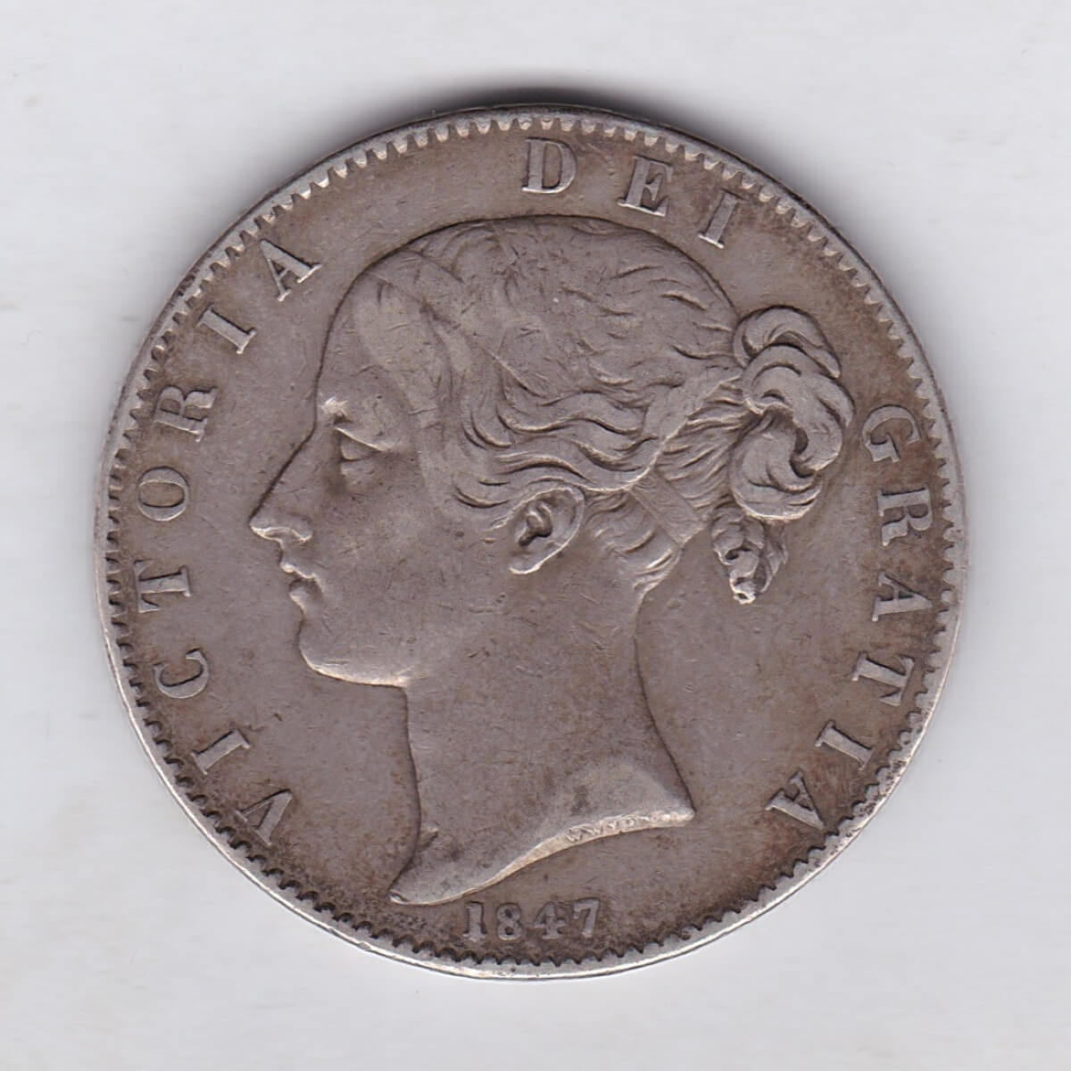 1847 Silver Crown Coin featuring Queen Victoria Young head on the Obverse and the Shield design on the reverse. In near very fine condition.