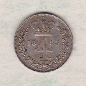 1853 silver maundy fourpence coin featuring Queen Victoria on the Obverse. The crowned denomination dividing date within an oak wreath on the Reverse.