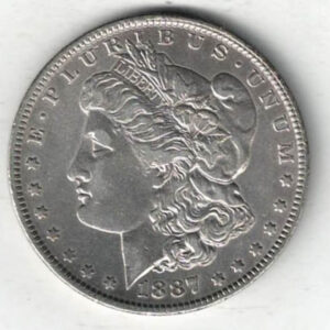 1887 O Silver USA Morgan Dollar coin featuring lady liberty on the obverse. The eagle holding arrows and an olive branch on the reverse.