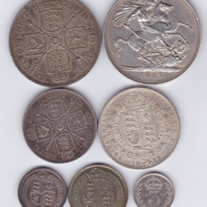 1887 Seven Coin Silver Set. This seven coin set includes the crown down to threepence. Each coin features the Jubilee Head design on the obverse.