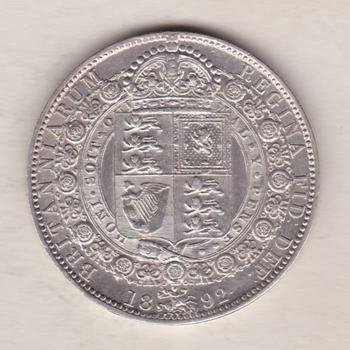 1892 Silver Halfcrown coin featuring the Jubilee head of Queen Victoria on the Obverse. The shield of royal arms completes the Reverse design.