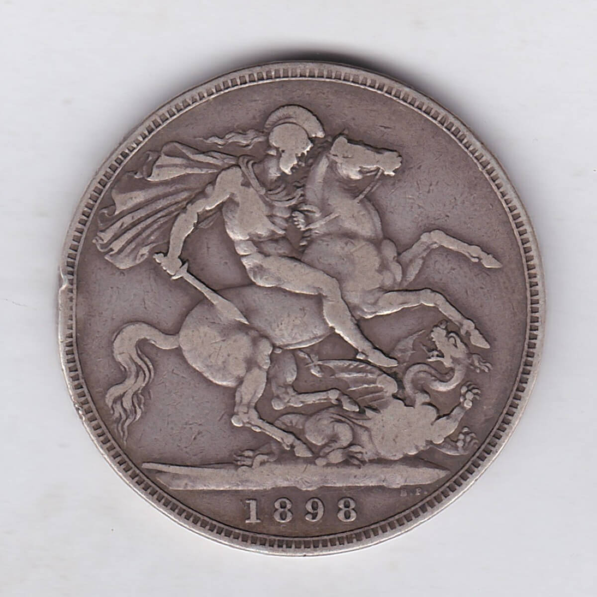 1898 LXII silver crown Silver Crown Coin featuring Queen Victoria old head or vailed head on the Obverse and the St George & dragon design on the reverse.