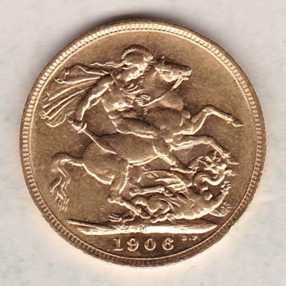 1906 M Gold Sovereign Coin. The coin features King Edward VII on the Obverse. St George and the dragon on the reverse. The M Melbourne, Australia Mintmark.