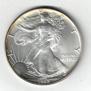 1992 Silver USA One Ounce Eagle. The liberty is on the obverse, The eagle is on the reverse. The coin contains one ounce of 999 fine silver.