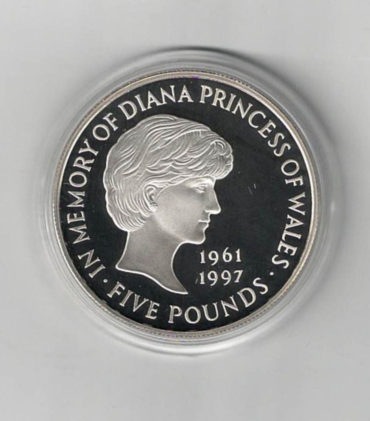 1999 Diana Princess of Wales five pound silver proof coin. The reverse features Head of Diana, Princess of Wales. Obverse features Queen Elizabeth II.