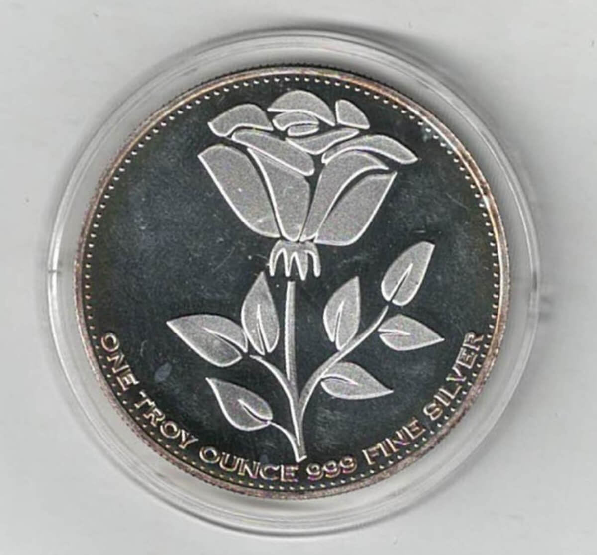 2012 Silver One Ounce Round English Rose. All of our silver coins/rounds have been pre-owned and are in stock for dispatch. You are buying one round.