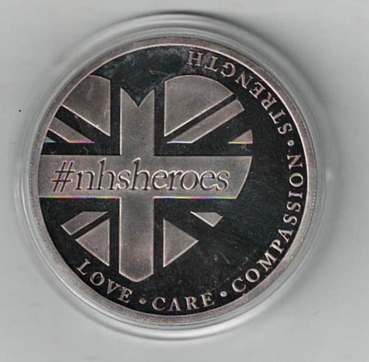 2020 Saint Helena Silver One Ounce NHS Heroes Coin, A nhs heart is on the reverse. The coin contains one ounce of .999 fine silver.