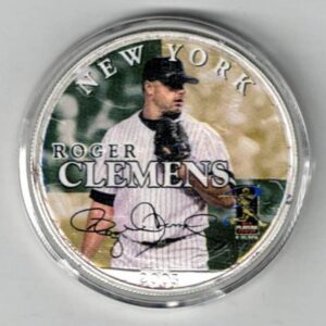 Boxed 2003 Silver USA One Ounce Eagle Colourised MLB Roger Clemens Coin. An eagle is on the reverse. The coin contains one ounce of 999 fine silver.