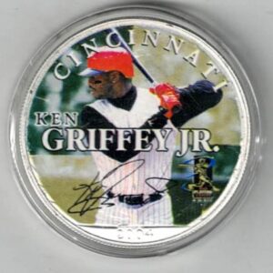 Boxed 2004 Silver USA One Ounce Eagle Colourised MLB Ken Griffey JR Coin. An eagle is on the reverse. The coin contains one ounce of 999 fine silver.